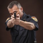 Police Officer Pointing Gun